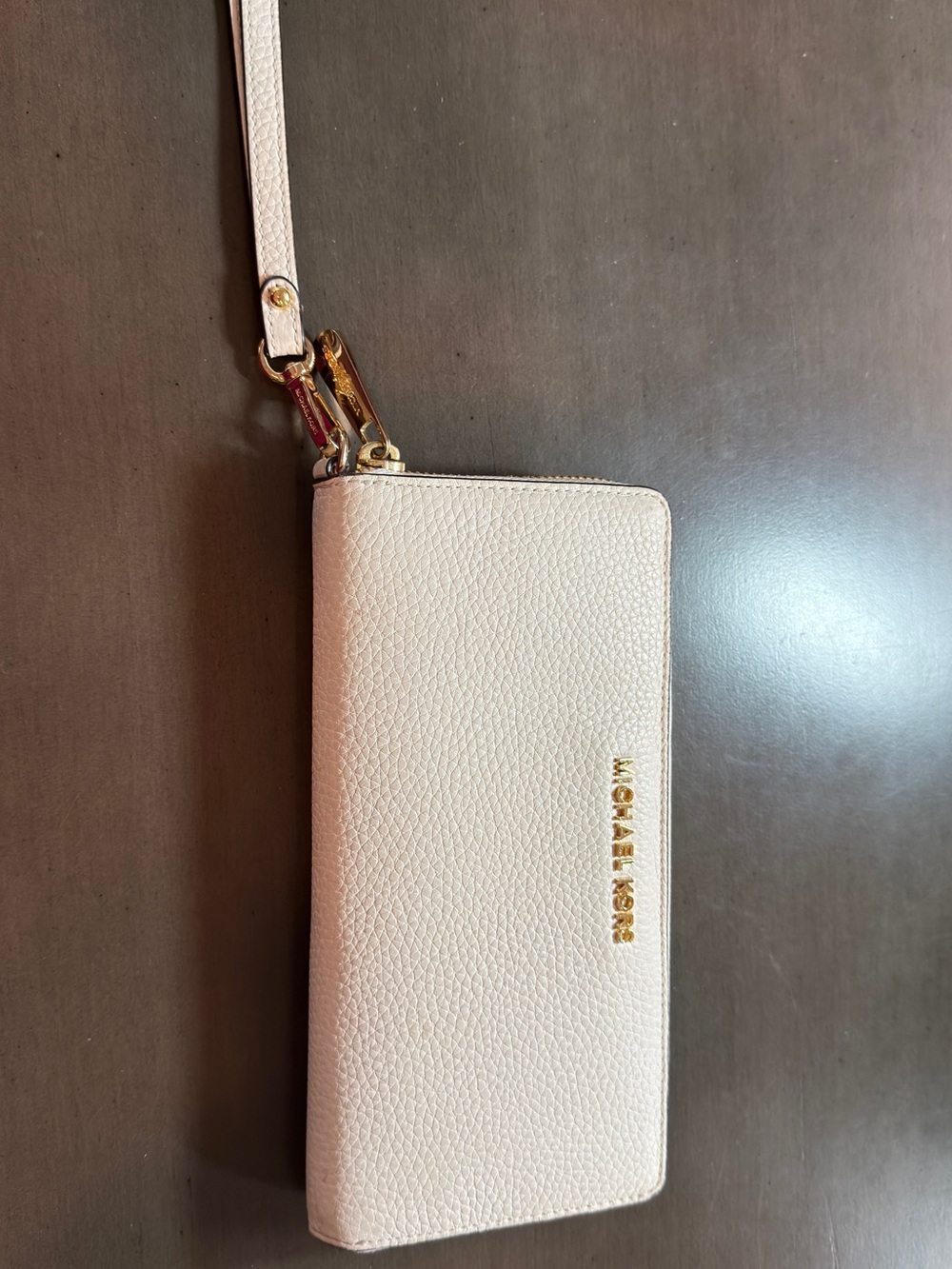 Michael Kors Pebbled Leather Wristlet in off white